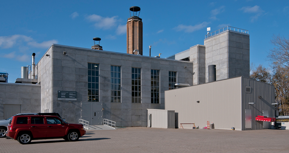 View enlarged image of a heating and cooling plant with steal smokestacks